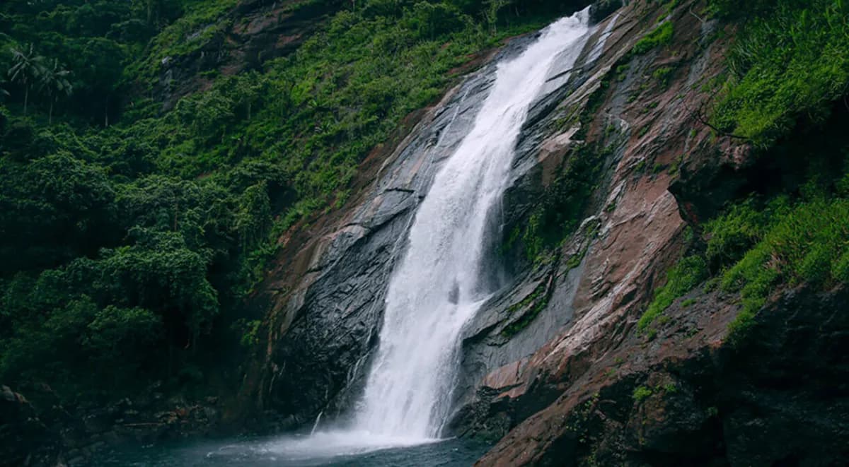 Marmala Waterfall cascading through the forest near Teekoy
